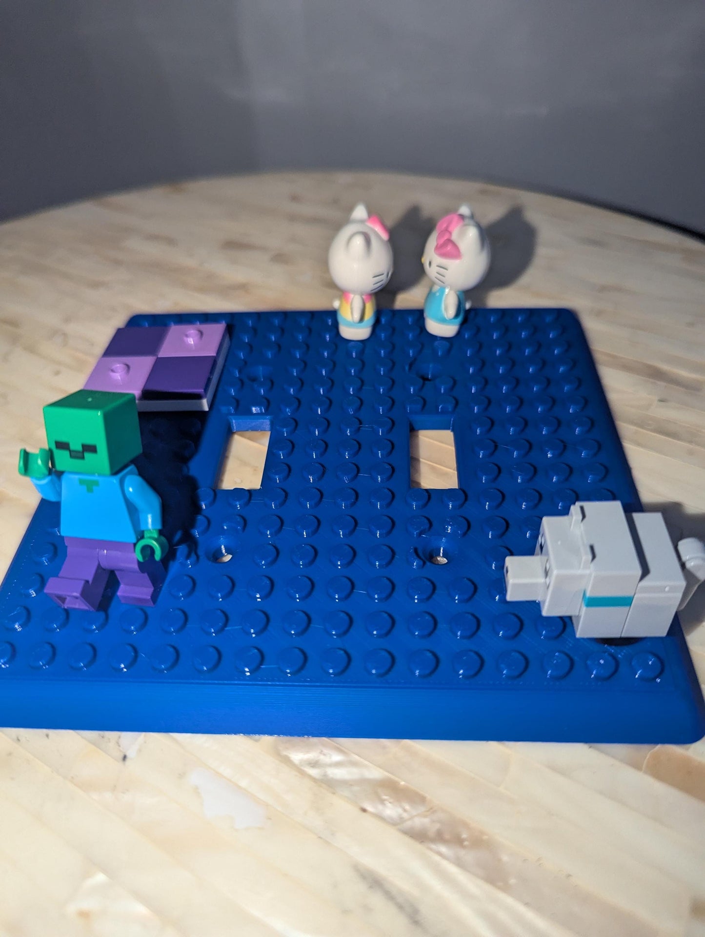 Blue Building Brick Light switch cover legos attached. Front Profile. Two switch plate