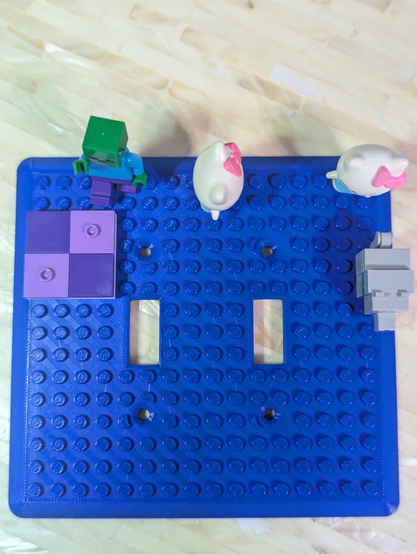 Blue Building Brick Light switch cover legos attached. Front Profile