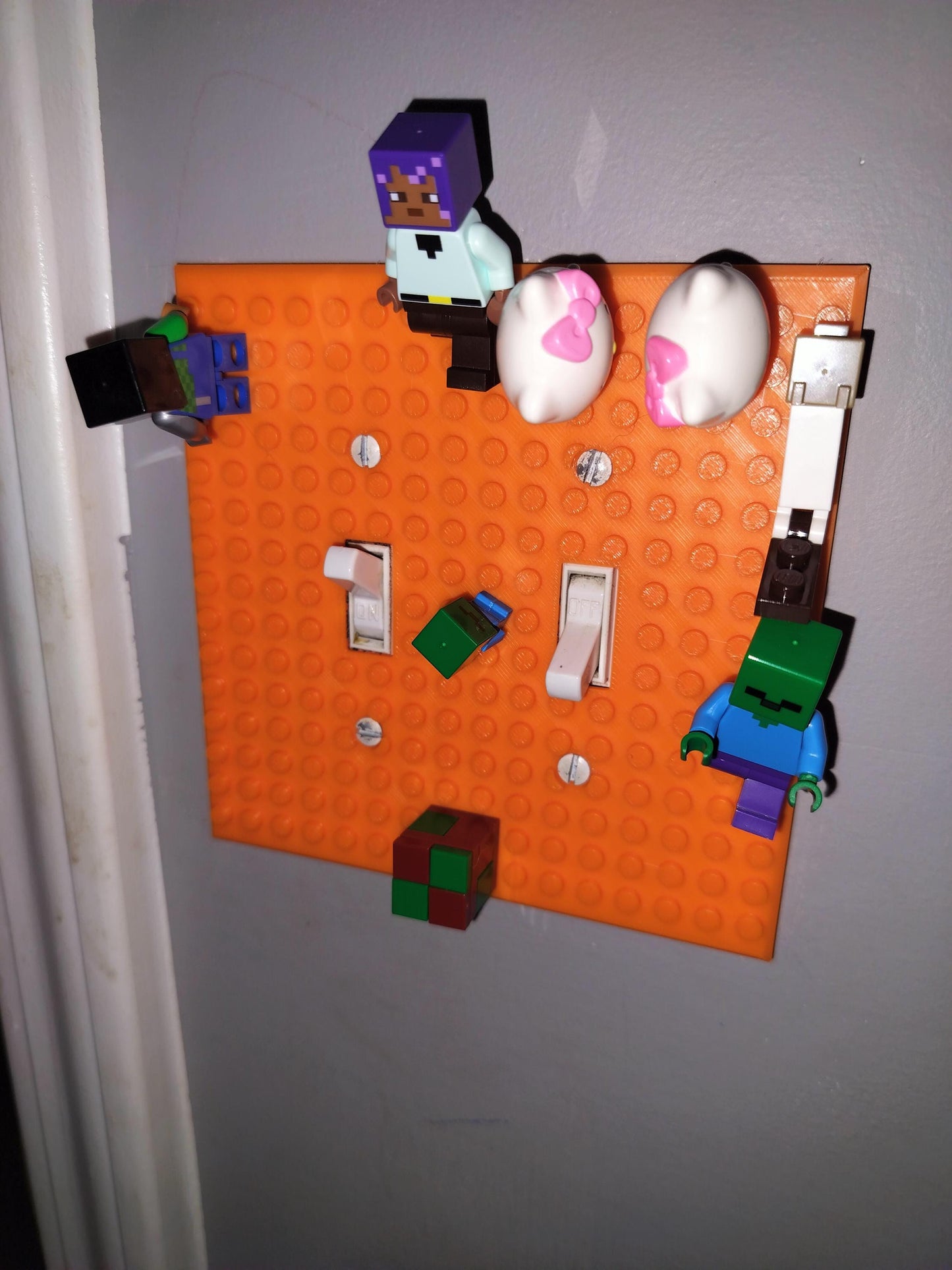 Building Brick Light switch cover with legos attached. Front Profile