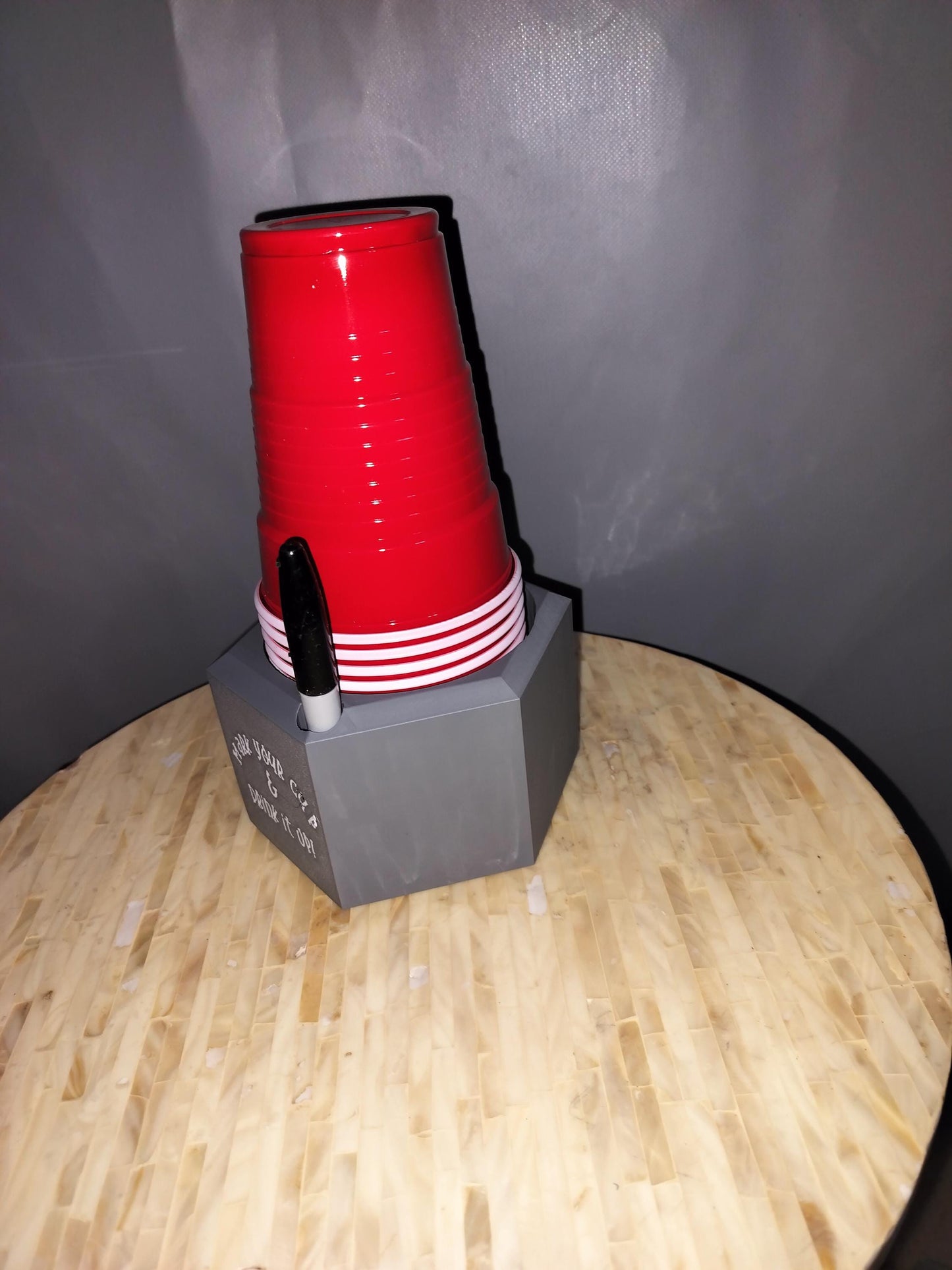 Red Cup Dispenser saying "Mark your cup and Drink it up" Front profile