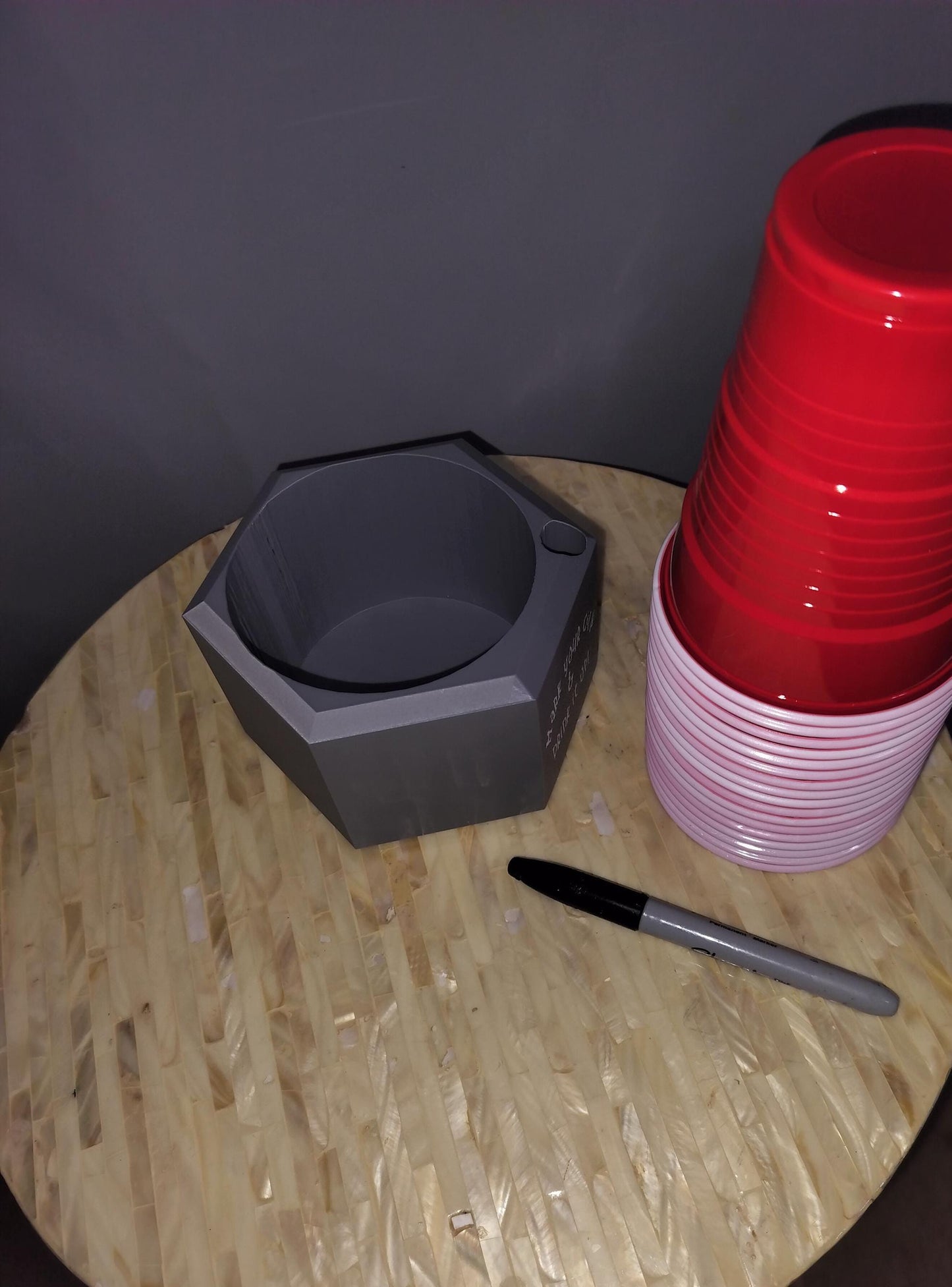 Solo Cup Dispenser saying "Mark your cup and Drink it up"Shown with nothing in the dispenser