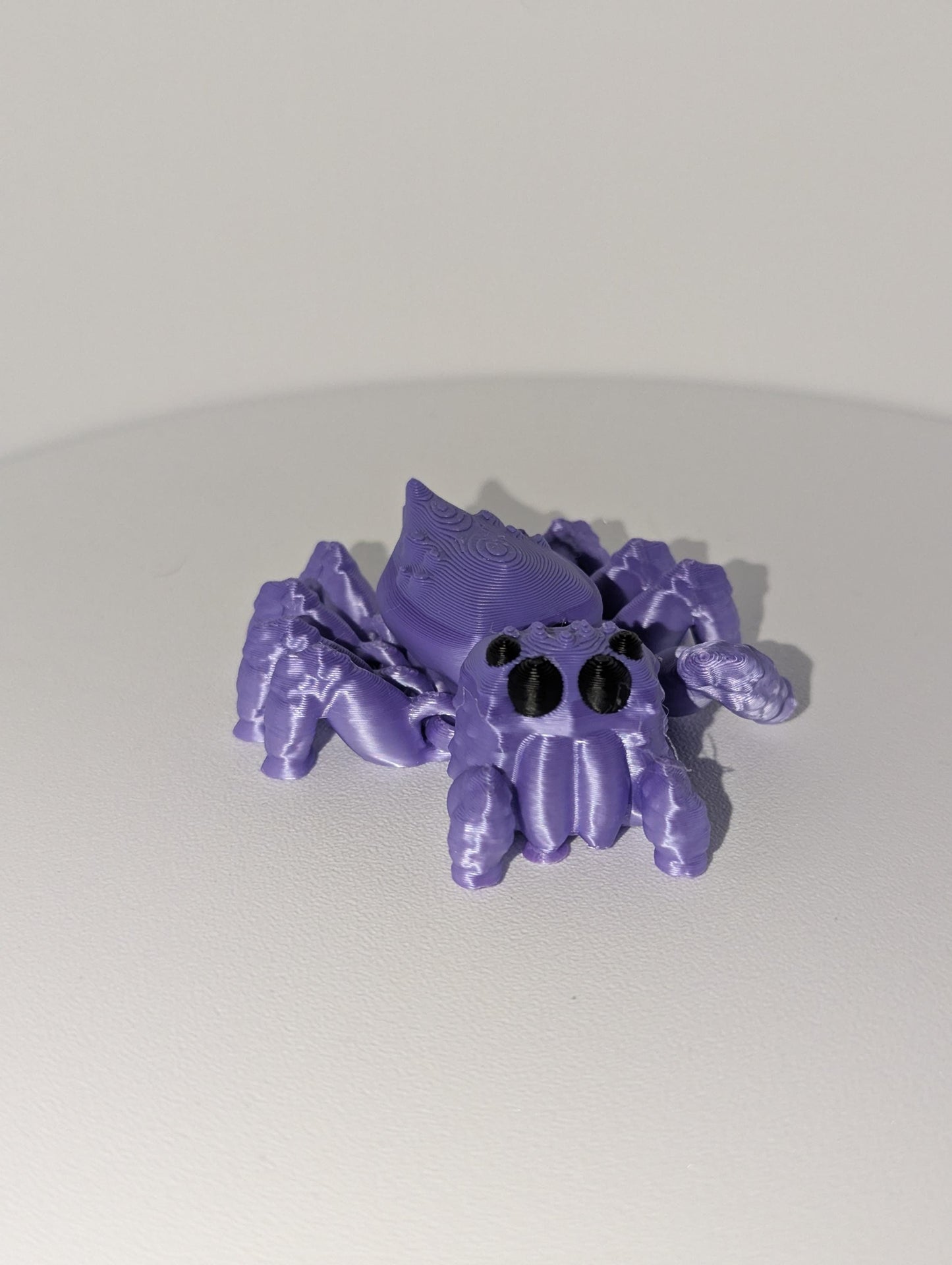 Articulated front profile spider. moveable legs super fun.
