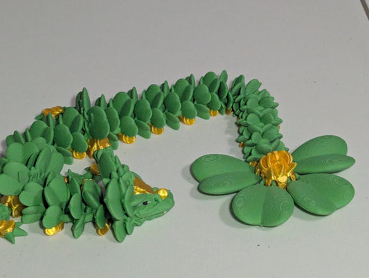 Lucky Clover Articulating Baby Dragon Initiative Design