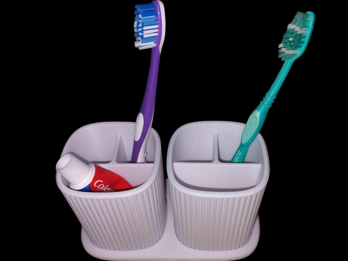 Bathroom toothbrush holder