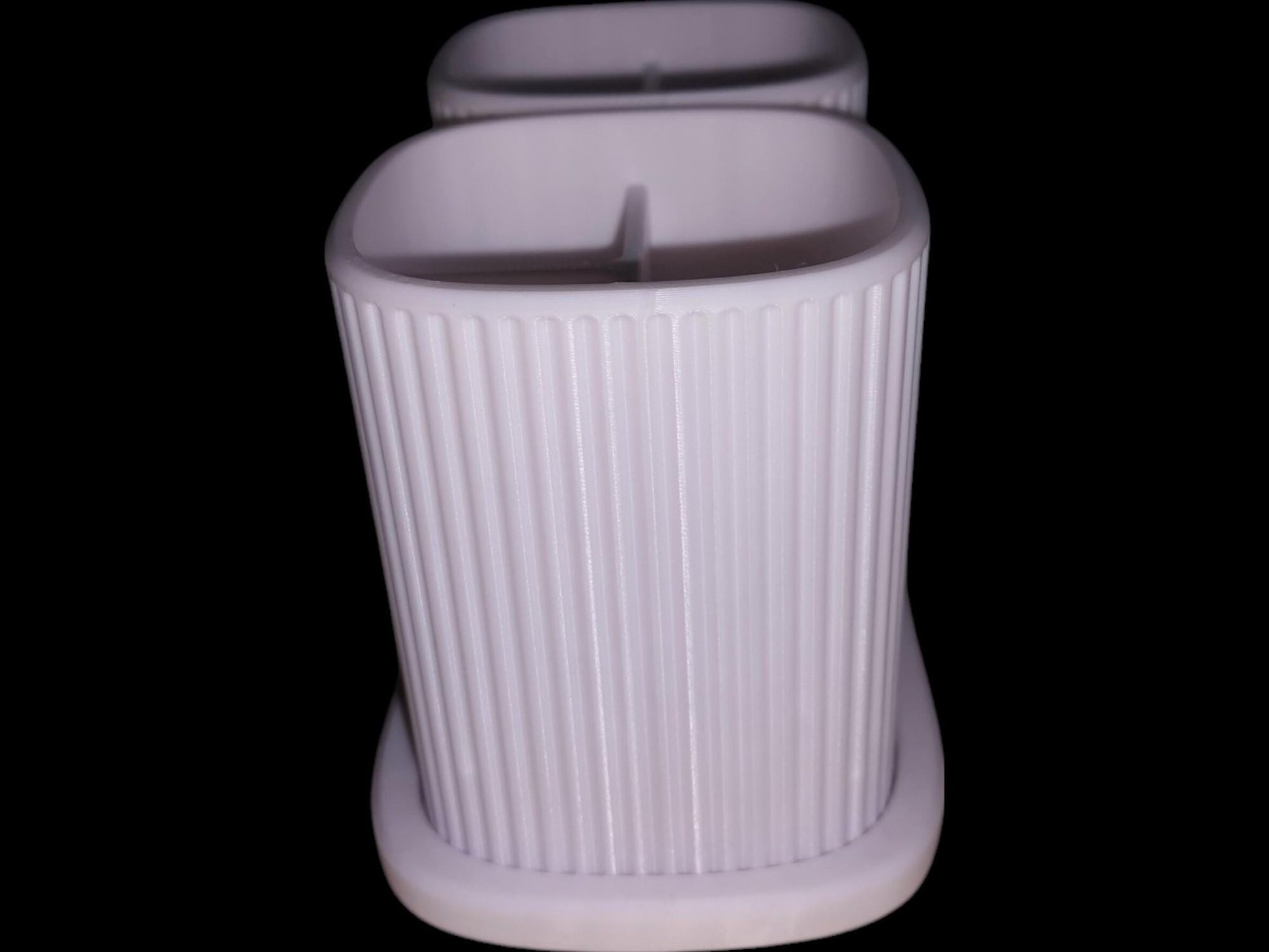 Bathroom toothbrush holder side profile
