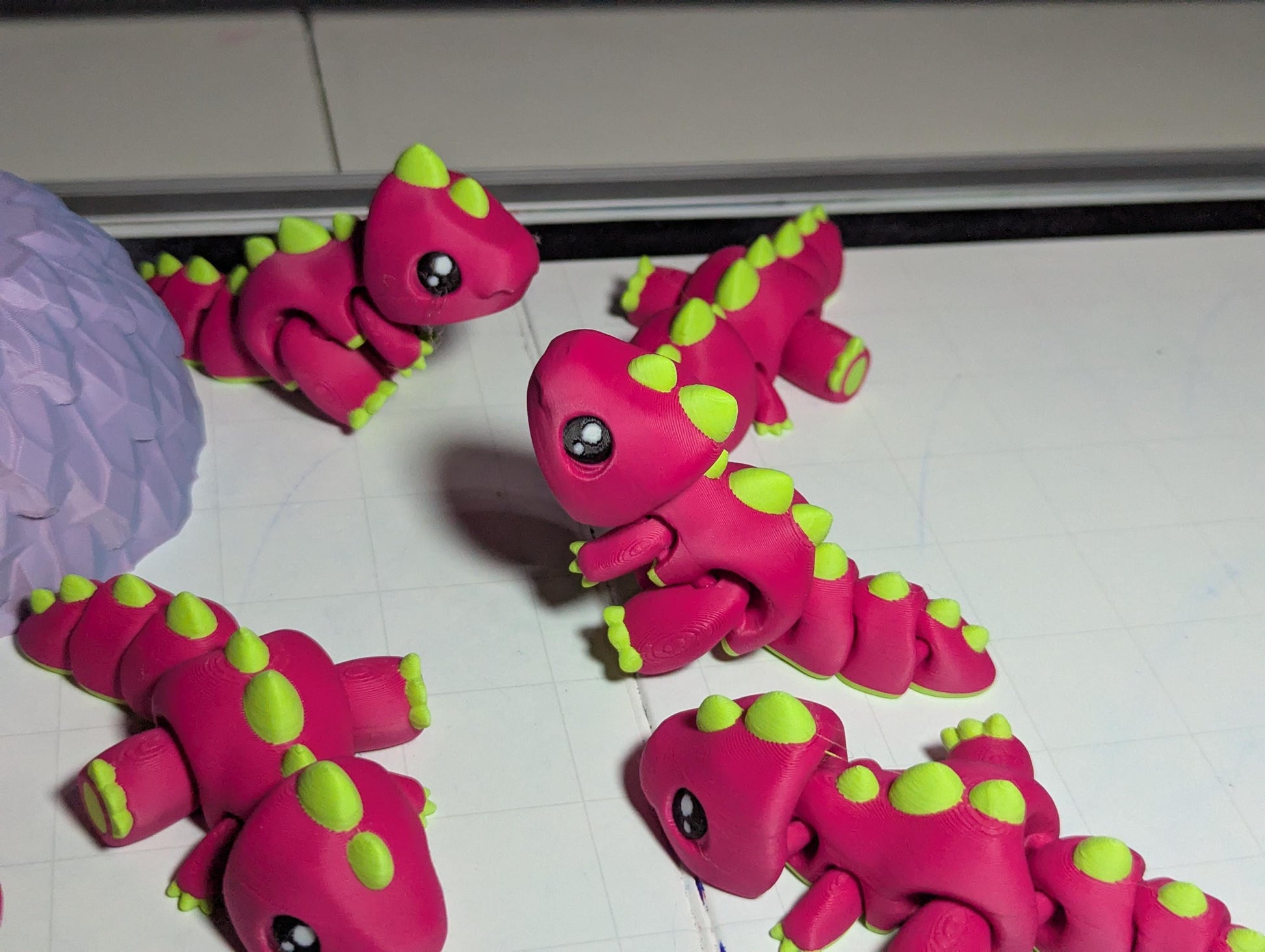 Mini Articulated Baby Dino – Pink & Green Fidget Toy – Cute Desk Pet or Gift